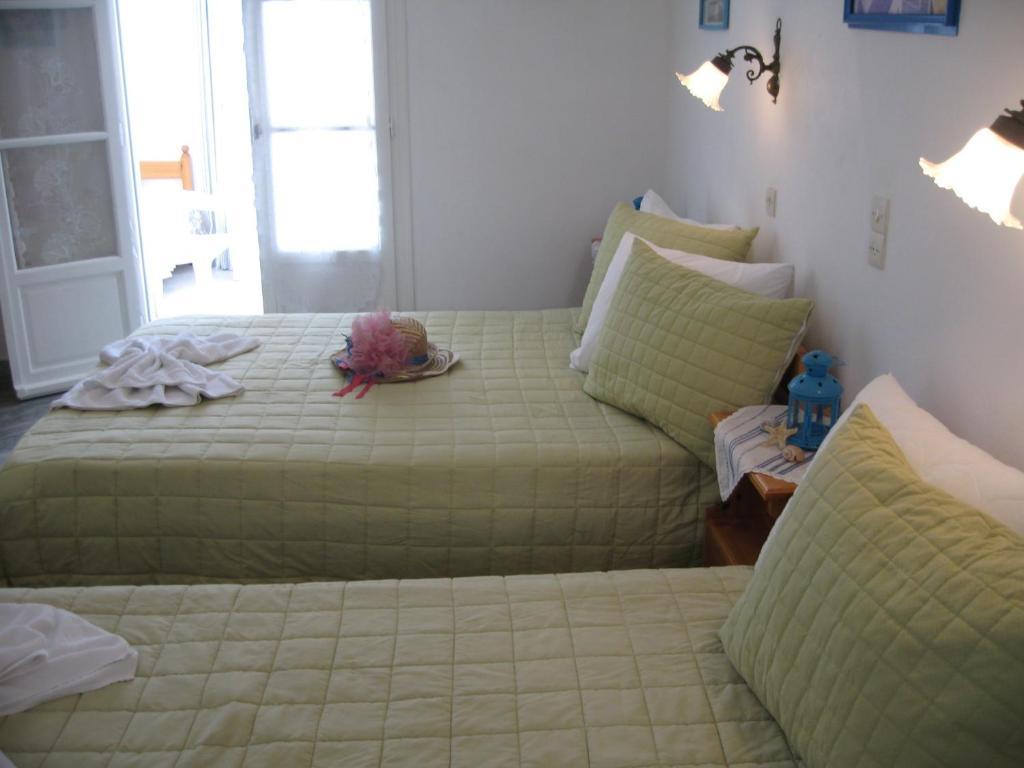 Augusta Studios & Apartments เนาซา ห้อง รูปภาพ